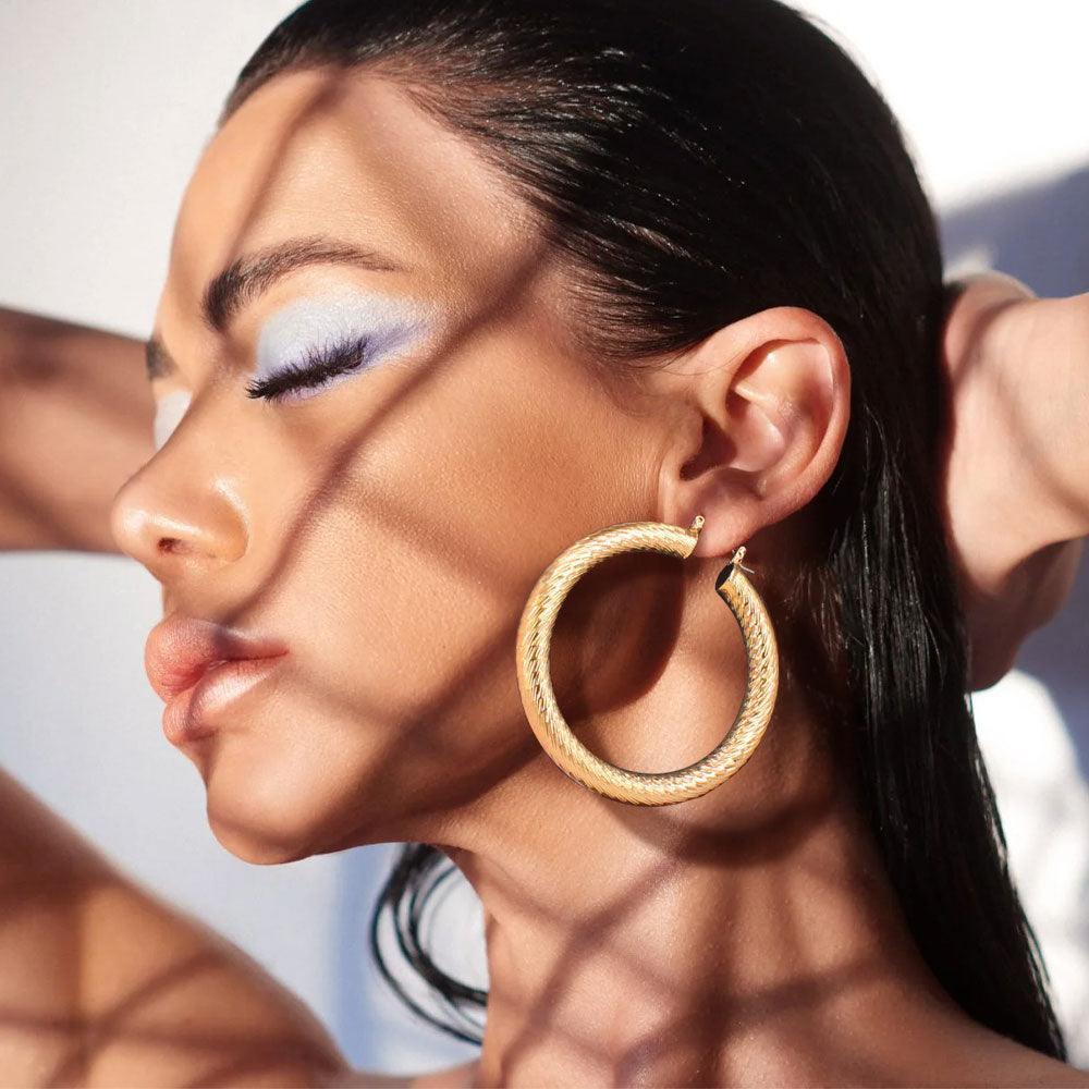Gold Textured Metal 2.5 Inch Hoop Pin Catch Earrings - Jewelry Store by Erik Rayo