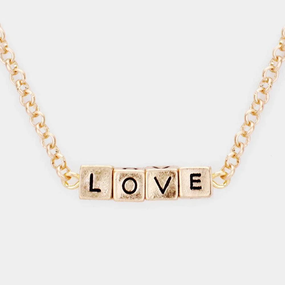 Gold LOVE Metal Cube Pendant Necklace - Jewelry Store by Erik Rayo