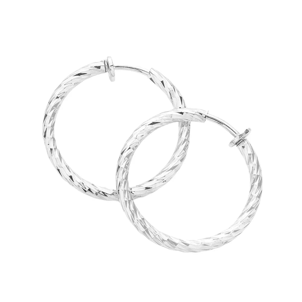 Silver 1.25" Textured metal hoop clip on earrings - Jewelry Store by Erik Rayo