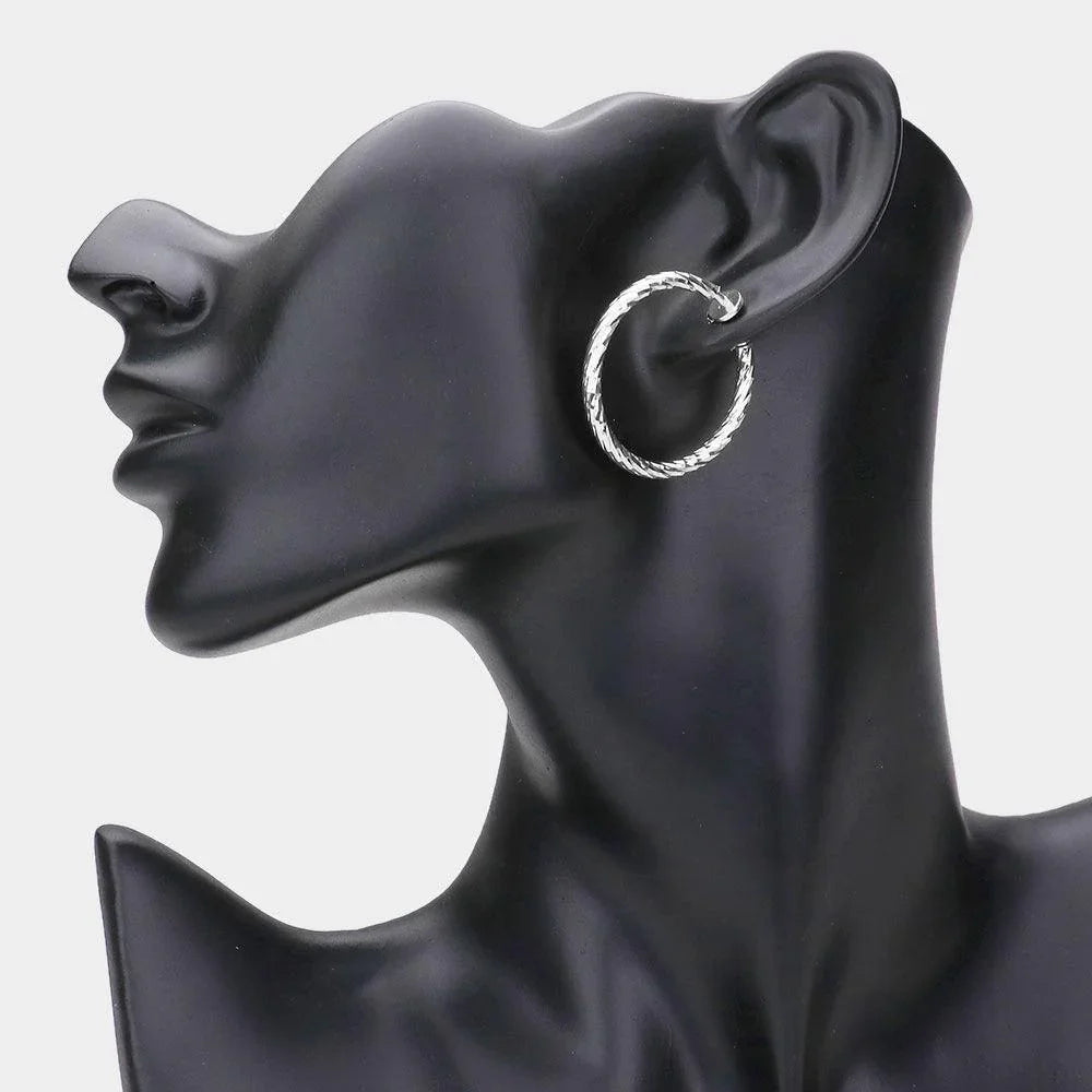 Silver 1.25" Textured metal hoop clip on earrings - Jewelry Store by Erik Rayo