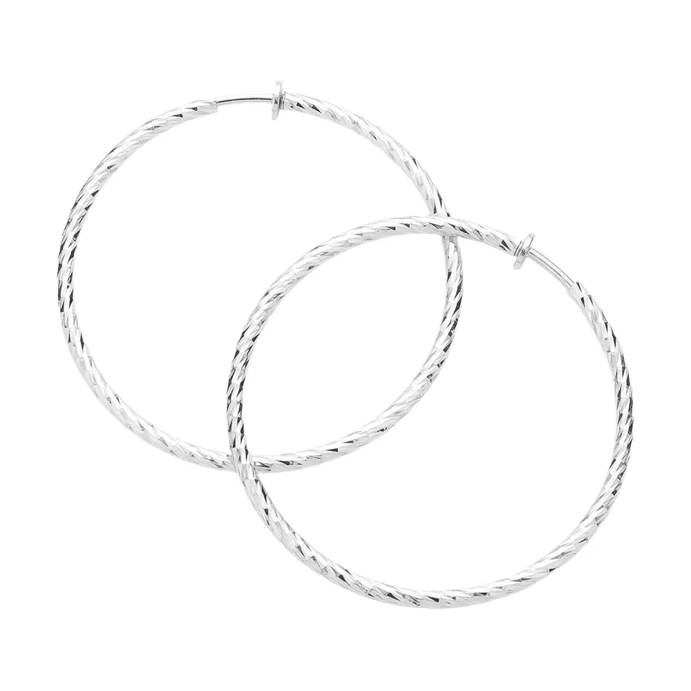 Silver 2.4" Textured metal hoop clip on earrings - Jewelry Store by Erik Rayo
