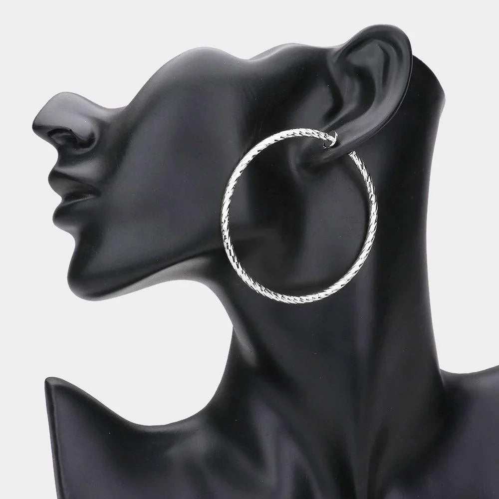 Silver 2.4" Textured metal hoop clip on earrings - Jewelry Store by Erik Rayo