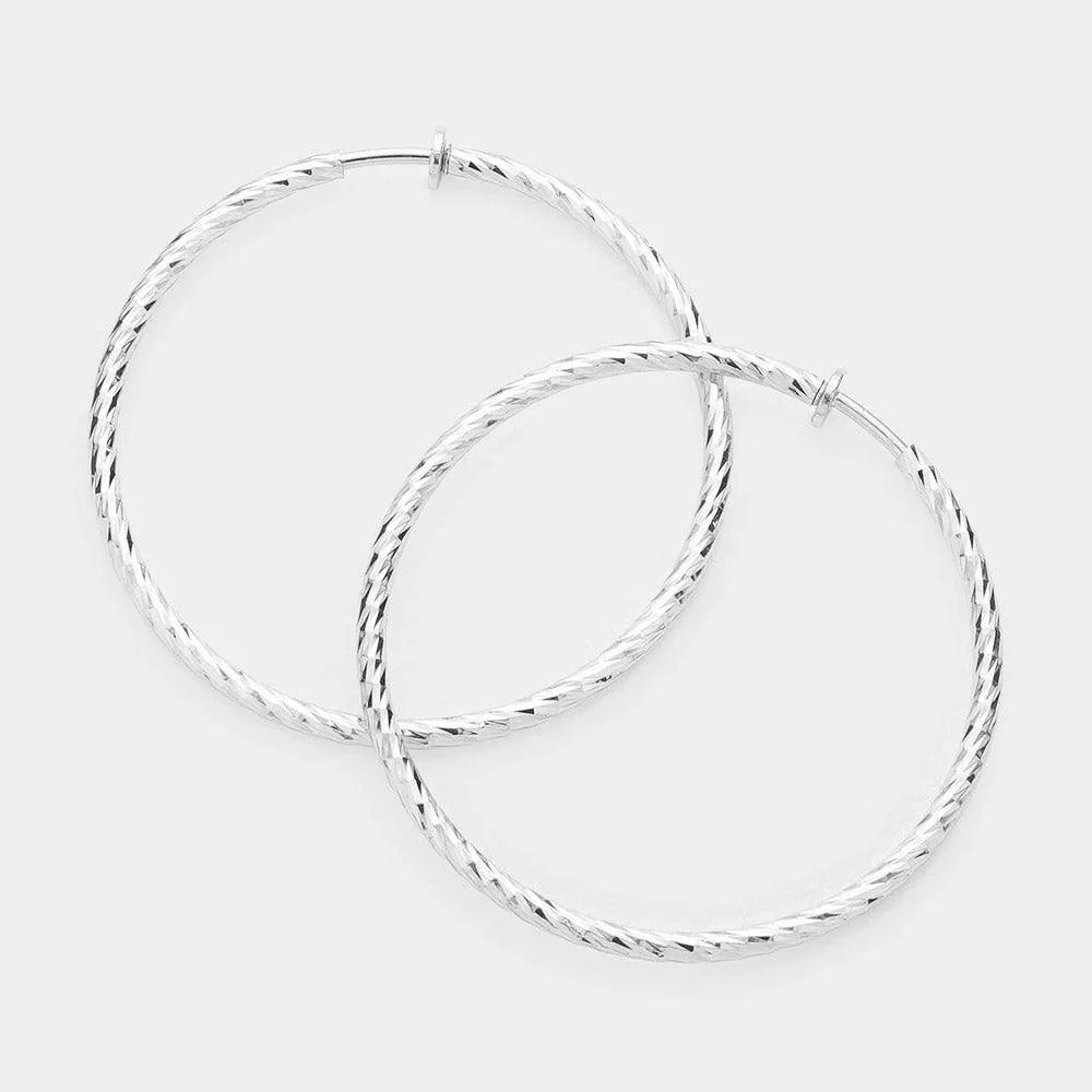 Silver 2.4" Textured metal hoop clip on earrings - Jewelry Store by Erik Rayo
