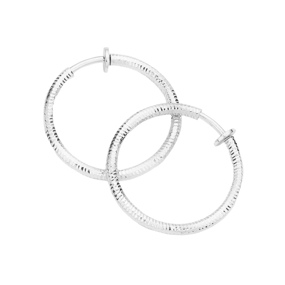 Silver 1.25 Inch Textured Metal Clip On Hoop Earrings