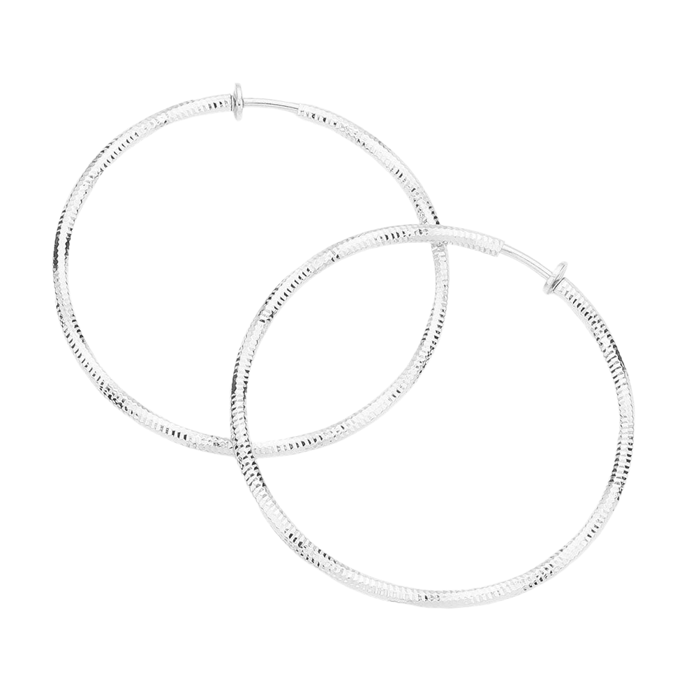 Silver 2.4 Inch Textured Metal Clip On Hoop Earrings