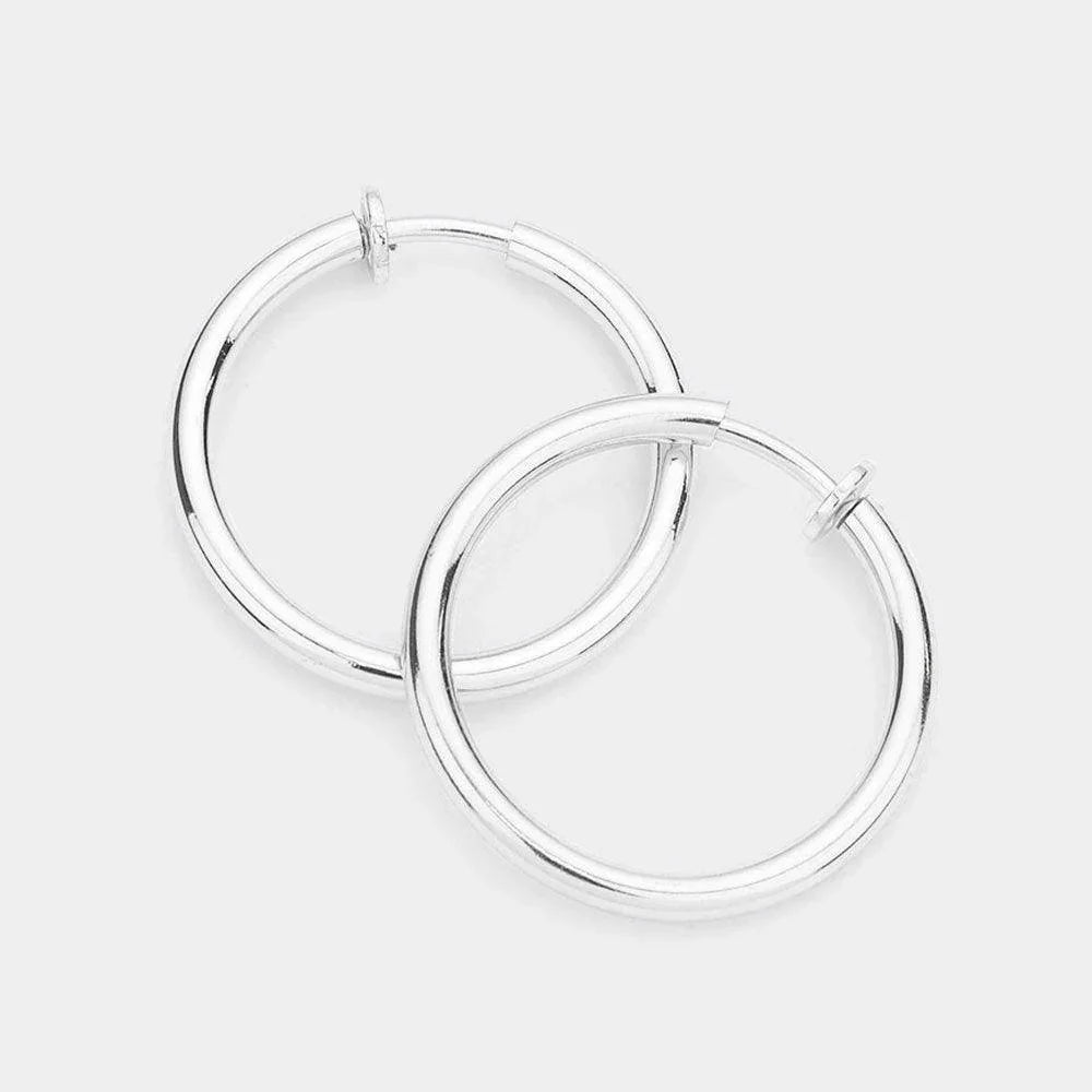 Silver 1.25 Inch Clip On Hoop Earrings - Jewelry Store by Erik Rayo