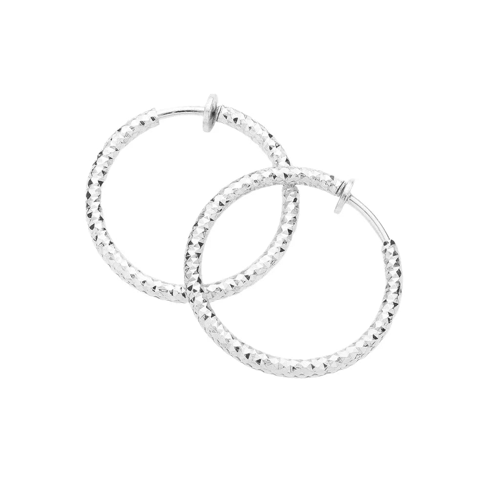 Silver 1.25" Textured Metal Hoop Clip on Earrings - Jewelry Store by Erik Rayo