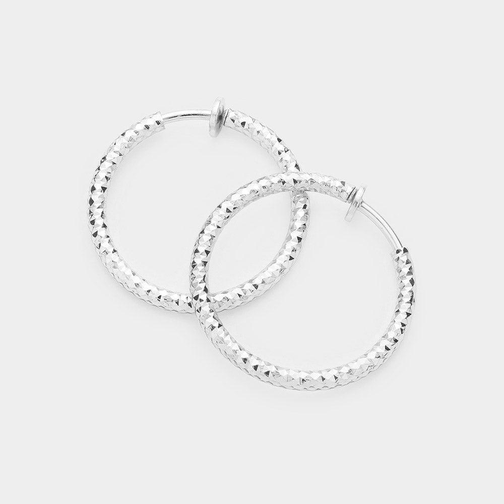 Silver 1.25" Textured Metal Hoop Clip on Earrings - Jewelry Store by Erik Rayo