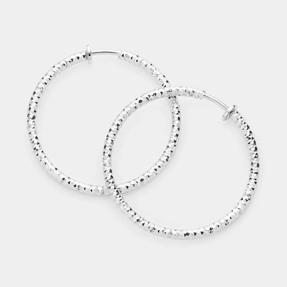 Silver 1.75" Textured Metal Hoop Clip on Earrings - Jewelry Store by Erik Rayo