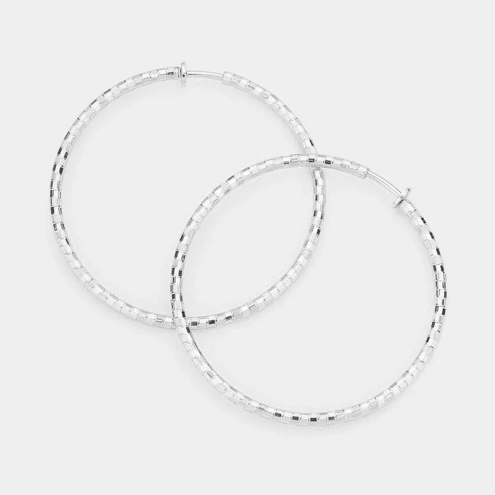 Silver 2.25 Inch Metal Hoop Clip On Earrings - Jewelry Store by Erik Rayo