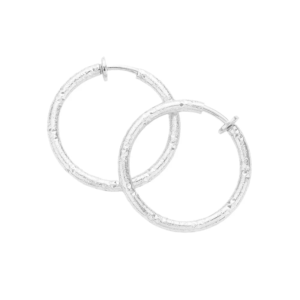 Silver 1.25 Inch Textured Metal Hoop Clip On Earrings - Jewelry Store by Erik Rayo