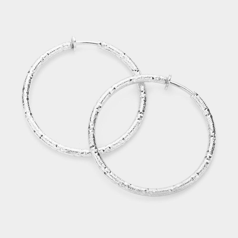 Silver 1.75 Inch Textured Metal Hoop Clip On Earrings - Jewelry Store by Erik Rayo