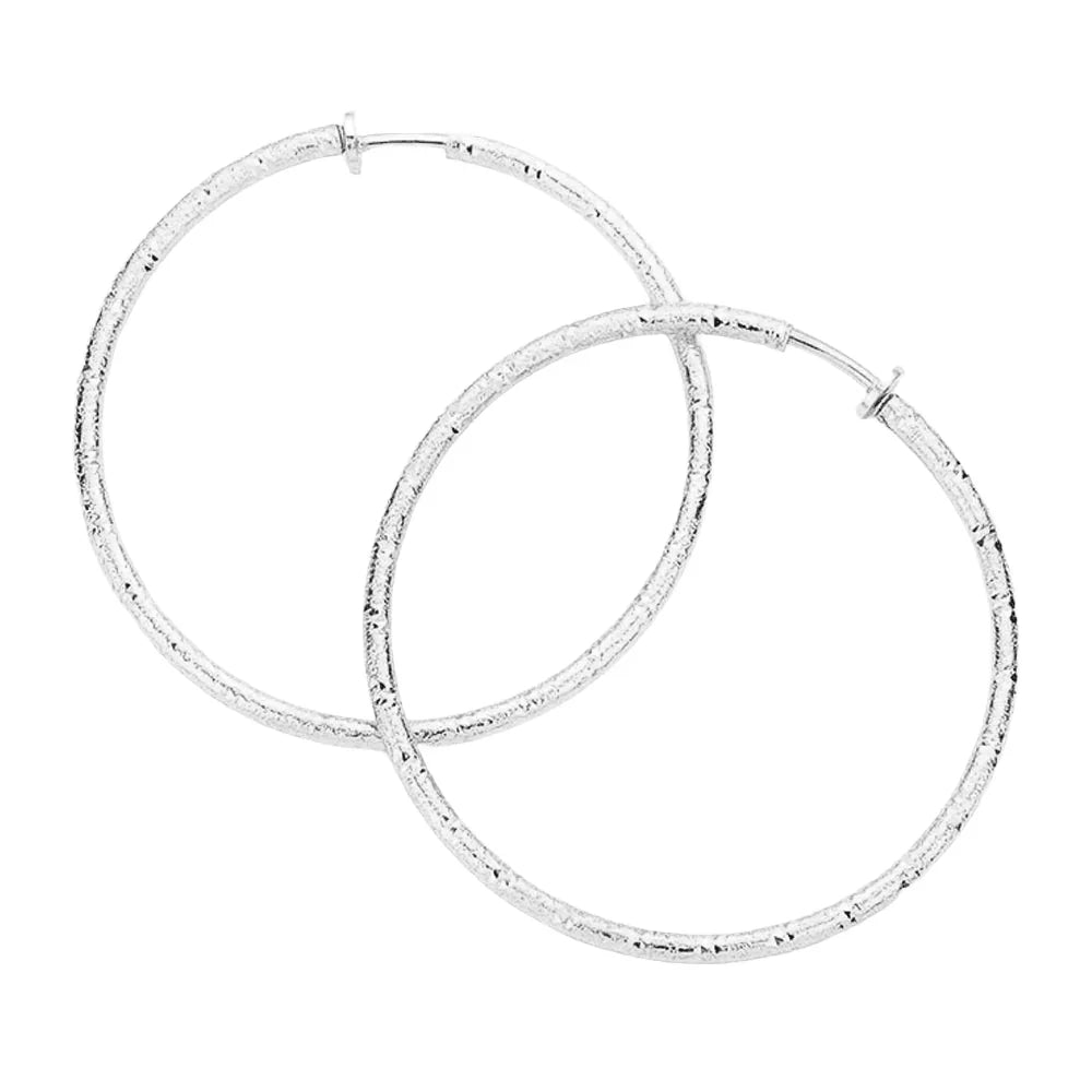 Silver 2.4 Inch Textured Metal Hoop Clip On Earrings - Jewelry Store by Erik Rayo