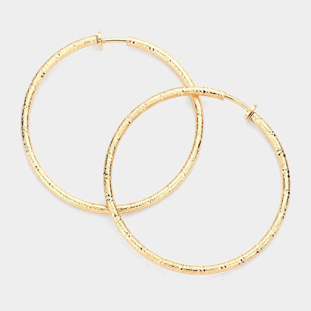 Gold 2.4 Inch Textured Metal Hoop Clip On Earrings - Jewelry Store by Erik Rayo