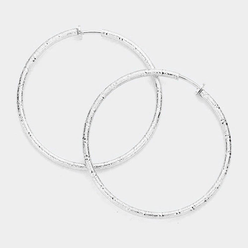 Silver 2.4 Inch Textured Metal Hoop Clip On Earrings - Jewelry Store by Erik Rayo