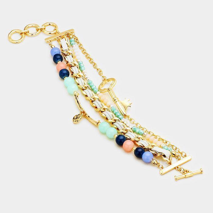 Gold Multi Strand Beaded Metal Key Accented Toggle Bracelet - Jewelry Store by Erik Rayo