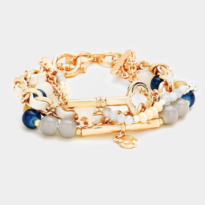 Gray Multi Strand Beaded Metal Key Accented Toggle Bracelet - Jewelry Store by Erik Rayo