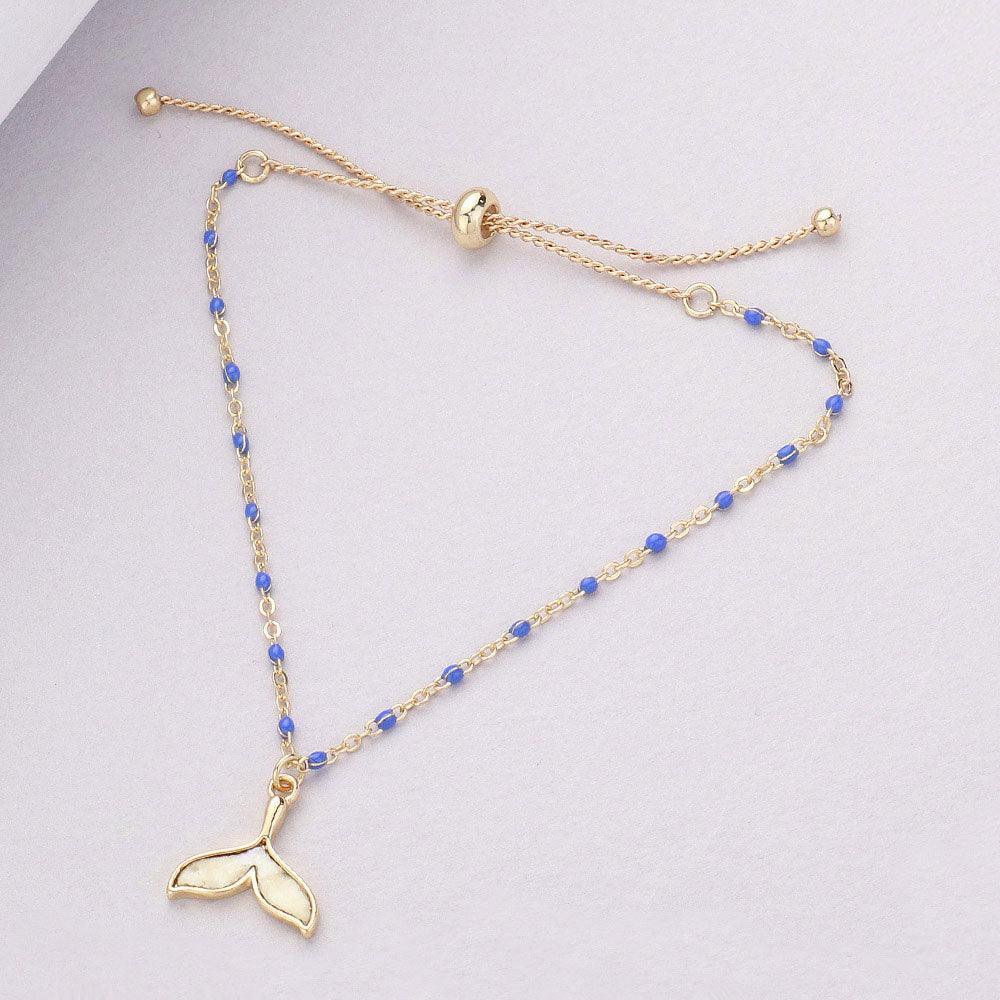 Blue Mother Of Pearl Whale Tail Charm Beads Station Pull Tie Cinch Bracelet - Jewelry Store by Erik Rayo