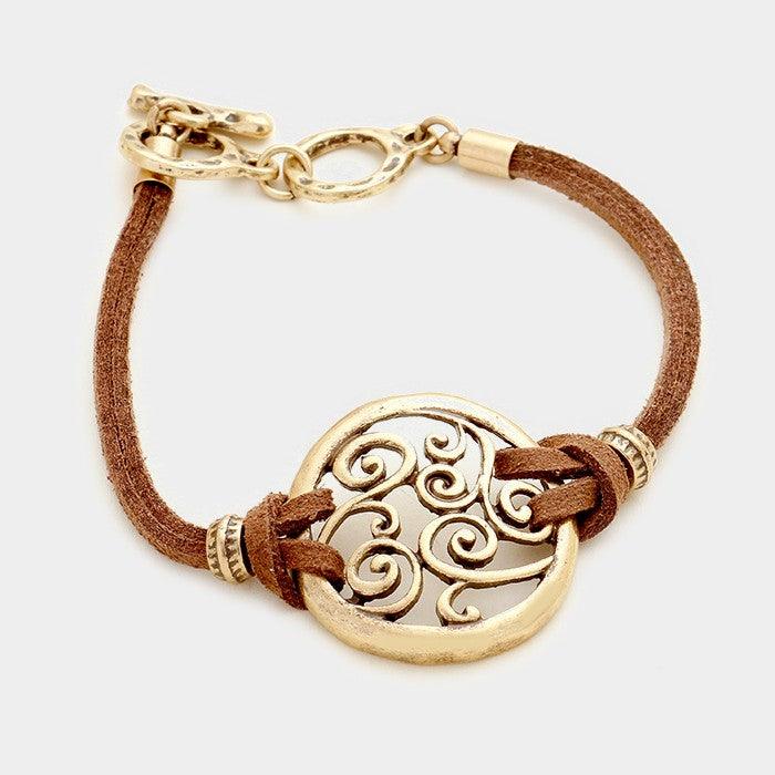 Gold Filigree disc & faux suede toggle bracelet