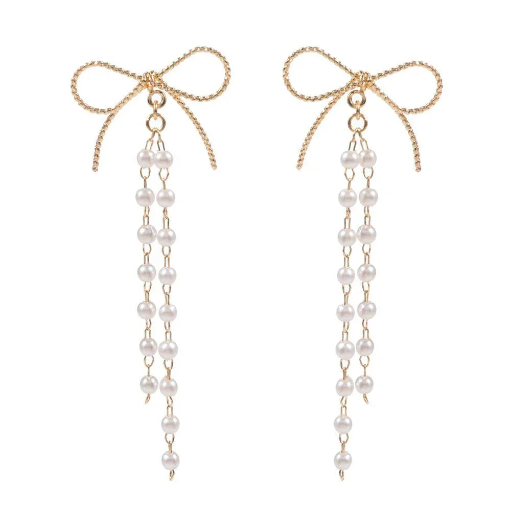 Cream Pearl Ribbon Bow Earrings - Jewelry Store by Erik Rayo