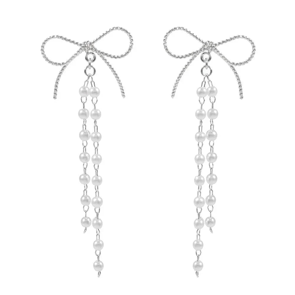 Cream Pearl Ribbon Bow Earrings - Jewelry Store by Erik Rayo