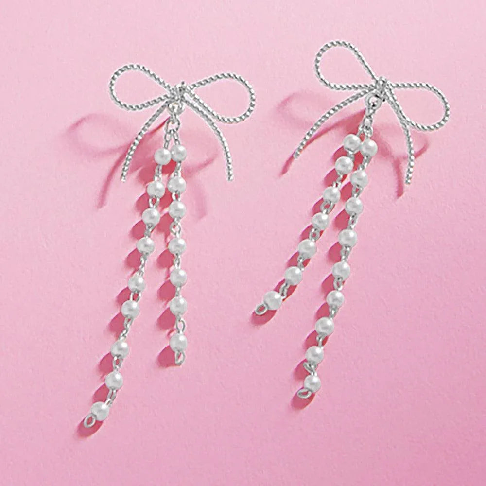 Cream Pearl Ribbon Bow Earrings - Jewelry Store by Erik Rayo