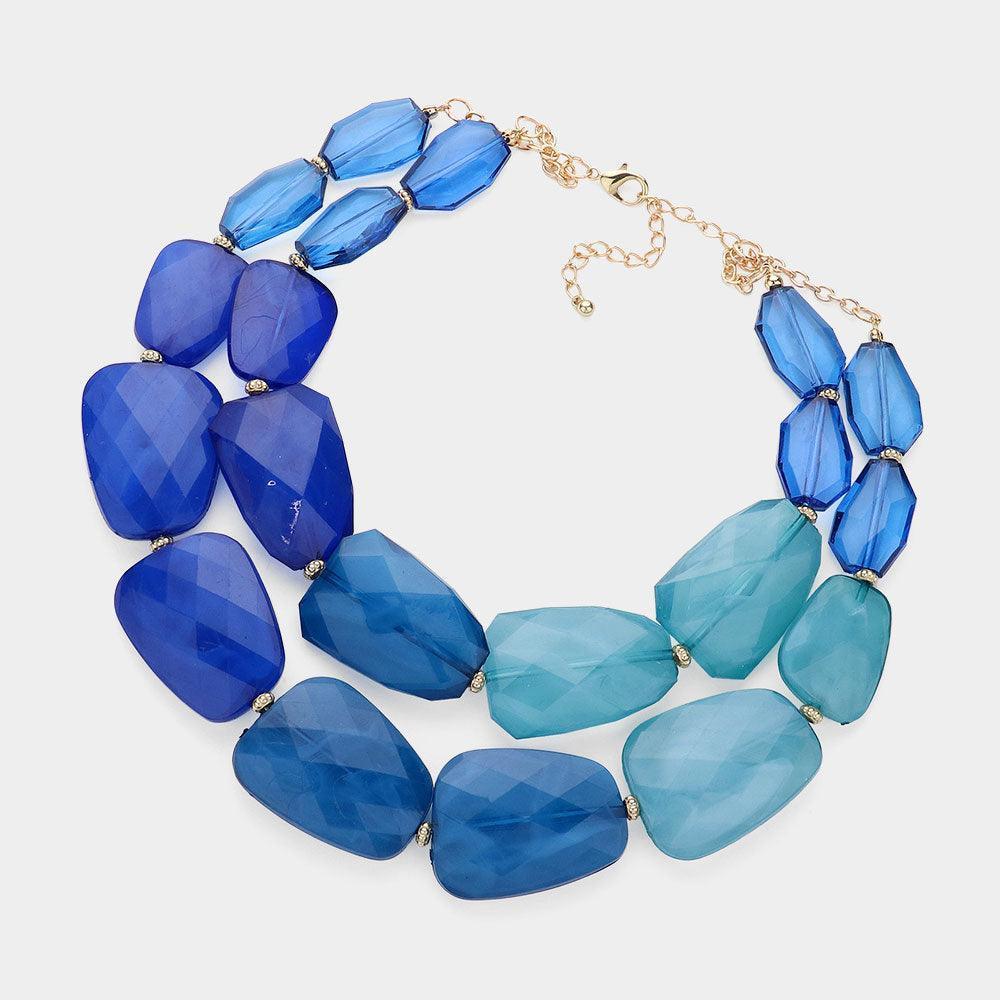 Blue Tiered Resin Pebble Necklace - Jewelry Store by Erik Rayo