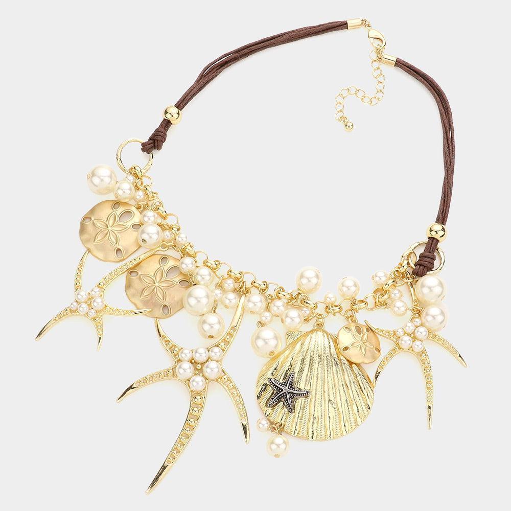 Gold Pearl embellished starfish shell pendant necklace - Jewelry Store by Erik Rayo