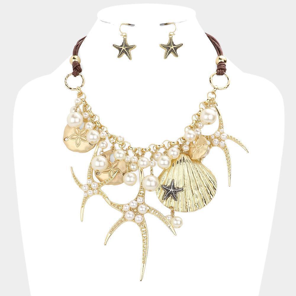 Gold Pearl embellished starfish shell pendant necklace - Jewelry Store by Erik Rayo
