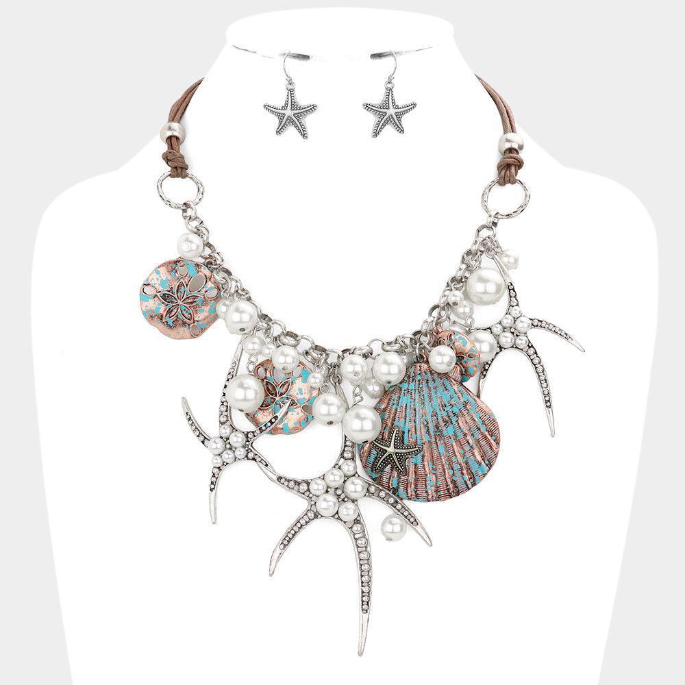 Pearl embellished starfish shell pendant necklace - Jewelry Store by Erik Rayo