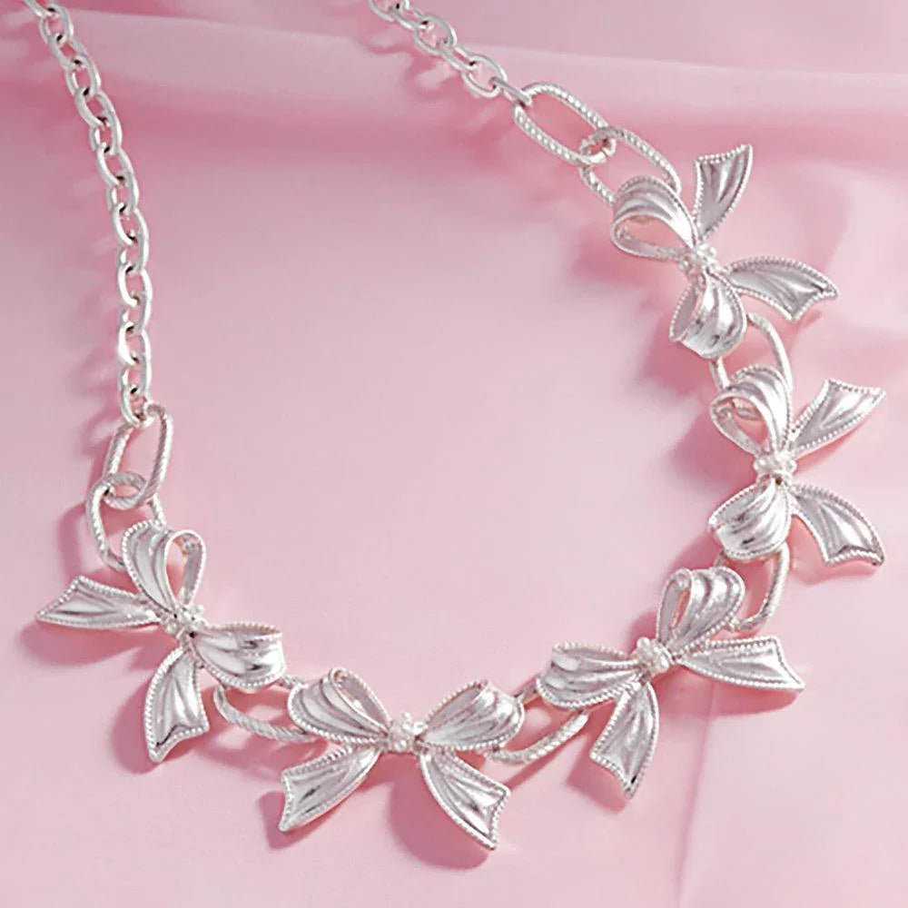 Silver Pearl Pointed Metal Bow Link Necklace - Jewelry Store by Erik Rayo