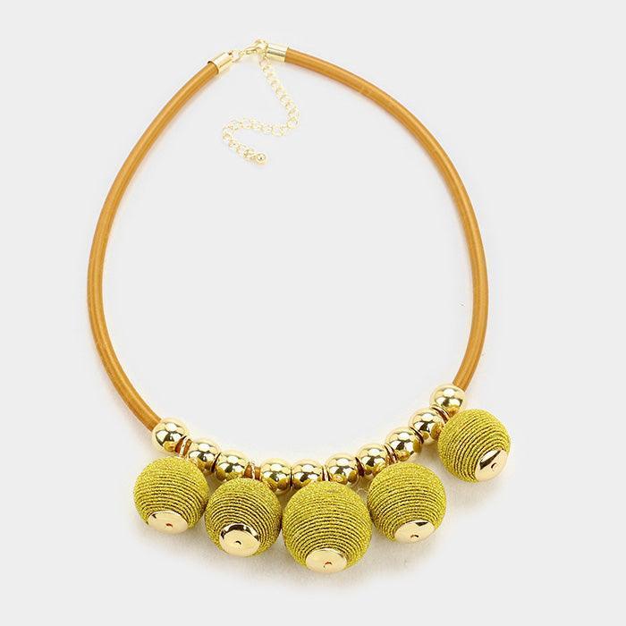 Gold Thread ball charm necklace - Jewelry Store by Erik Rayo