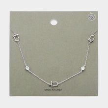 Load image into Gallery viewer, Stone Bezel Horseshoe Station Necklace
