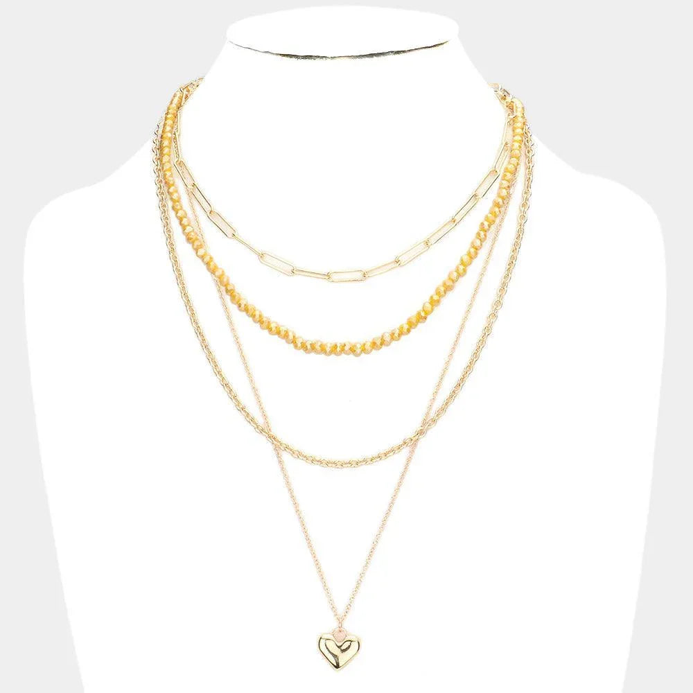 Yellow Metal Heart Pendant Multi Layered Necklace - Jewelry Store by Erik Rayo