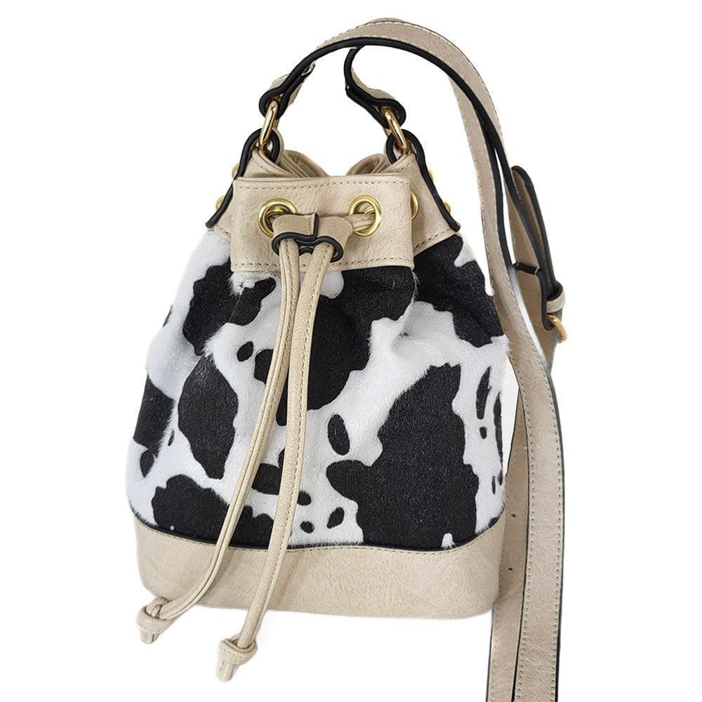 Cow Patterned Faux Leather Drawstring Crossbody Bag - Jewelry Store by Erik Rayo