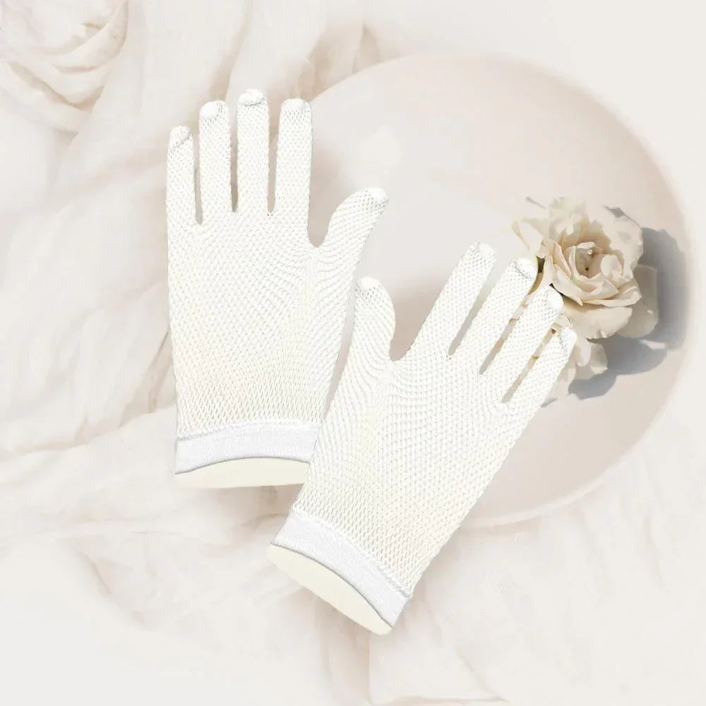 White Fishnet Wedding Gloves - Jewelry Store by Erik Rayo