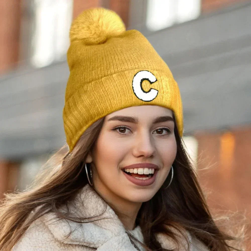 C Monogram Faux Fur Pom Pom Knit Beanie Hat - Jewelry Store by Erik Rayo