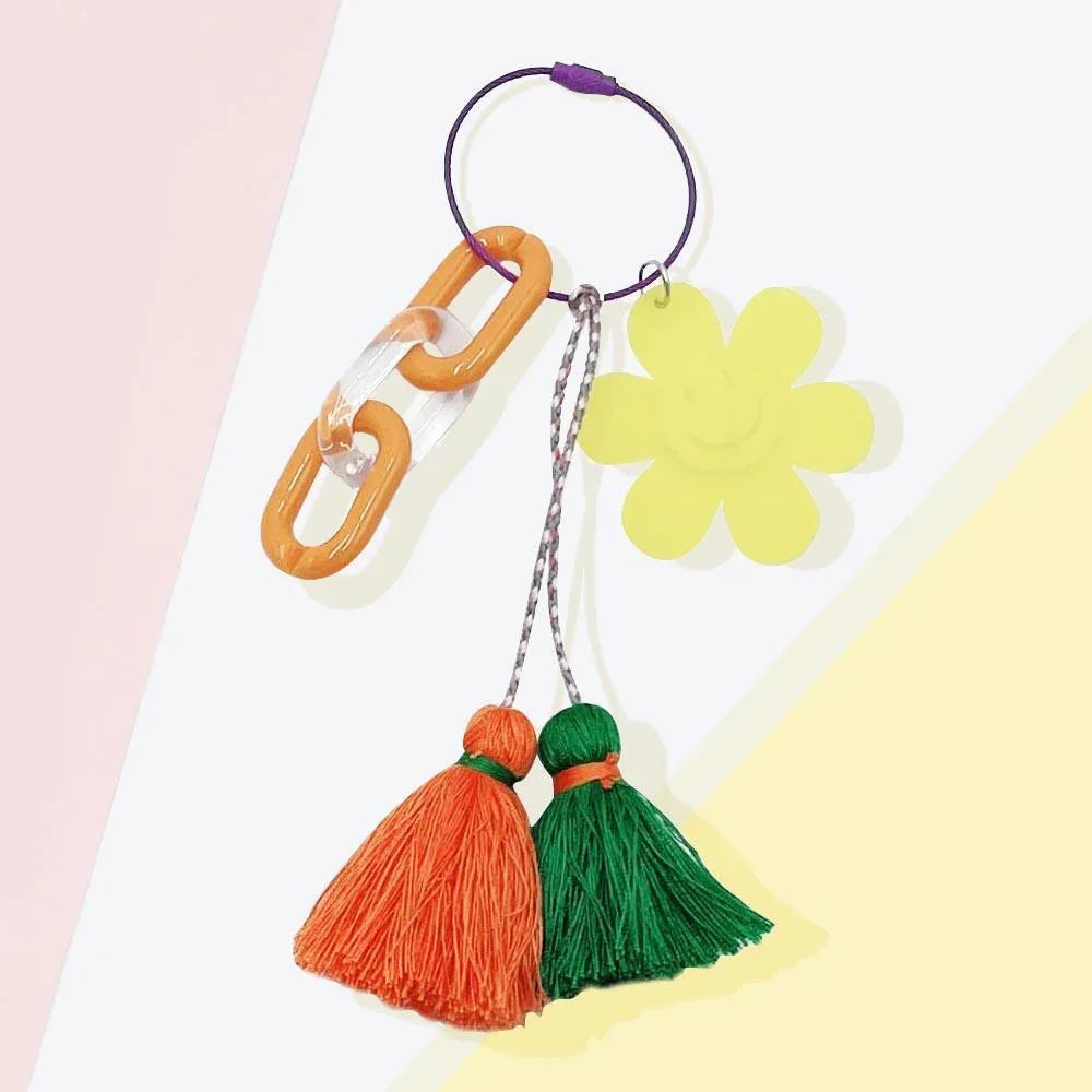Smile Flower Tassel Bag Charm / Keychain - Jewelry Store by Erik Rayo