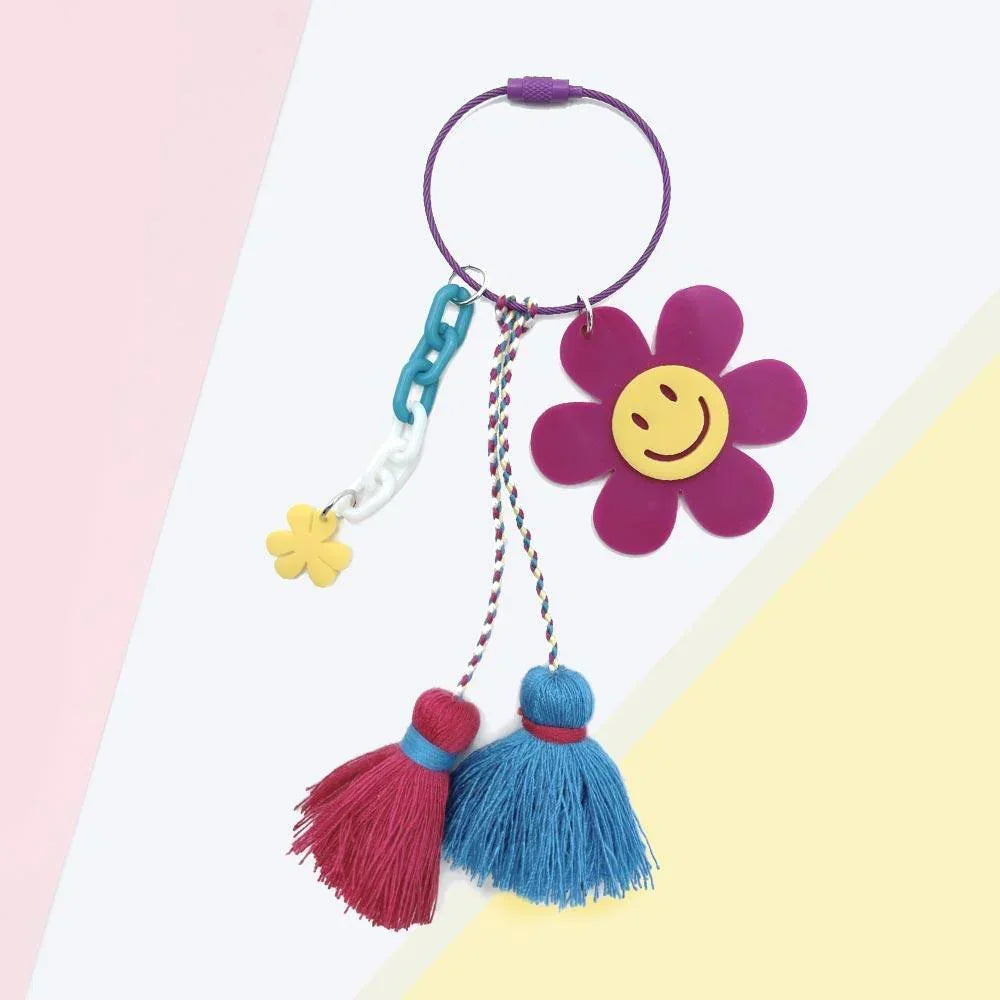 Smile Flower Tassel Bag Charm / Keychain - Jewelry Store by Erik Rayo