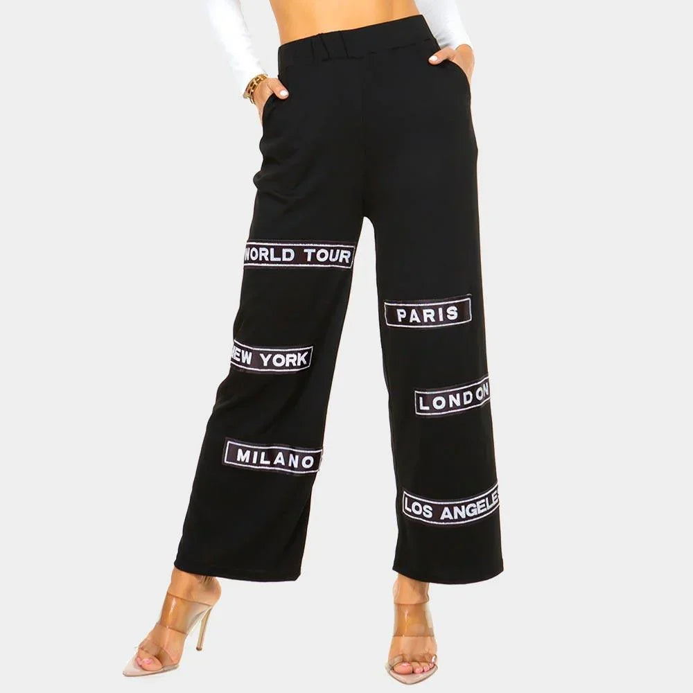 Black City Name Printed Pants - Jewelry Store by Erik Rayo