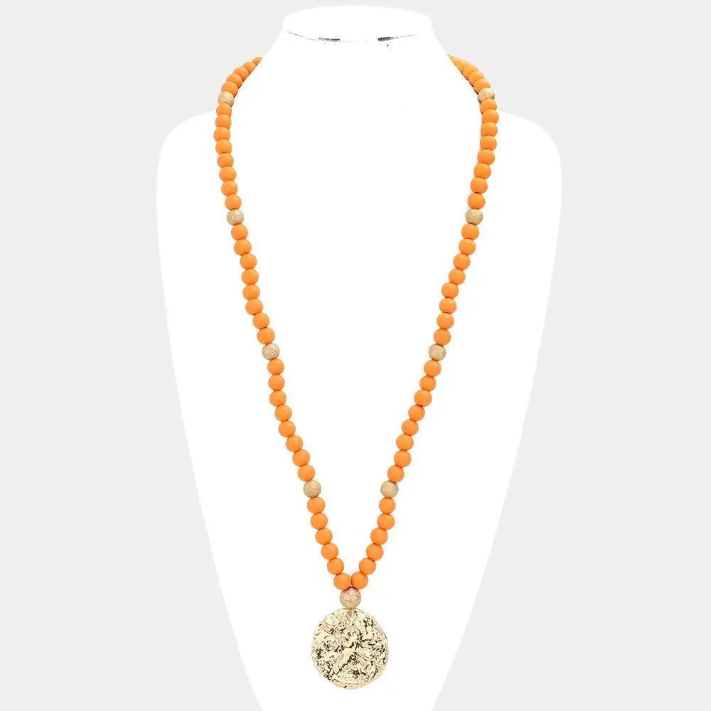 Orange Hammered Metal Round Pendant Wood Beaded Long Necklace - Jewelry Store by Erik Rayo