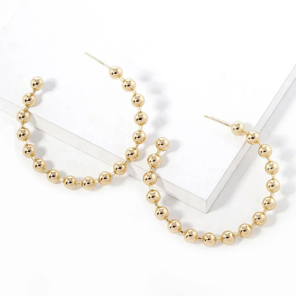Gold Gold Dipped Metal Ball Hoop Earrings - Jewelry Store by Erik Rayo