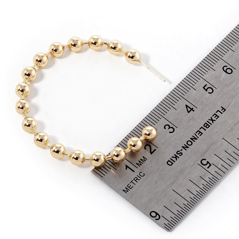 Gold Gold Dipped Metal Ball Hoop Earrings - Jewelry Store by Erik Rayo