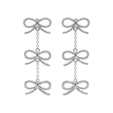 Load image into Gallery viewer, Silver Hypoallergenic Titanium Post Textured Bow Link Dropdown Earrings
