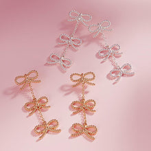 Load image into Gallery viewer, Silver Hypoallergenic Titanium Post Textured Bow Link Dropdown Earrings
