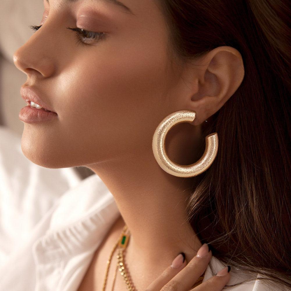 Gold Metal Hoop Earrings - Jewelry Store by Erik Rayo