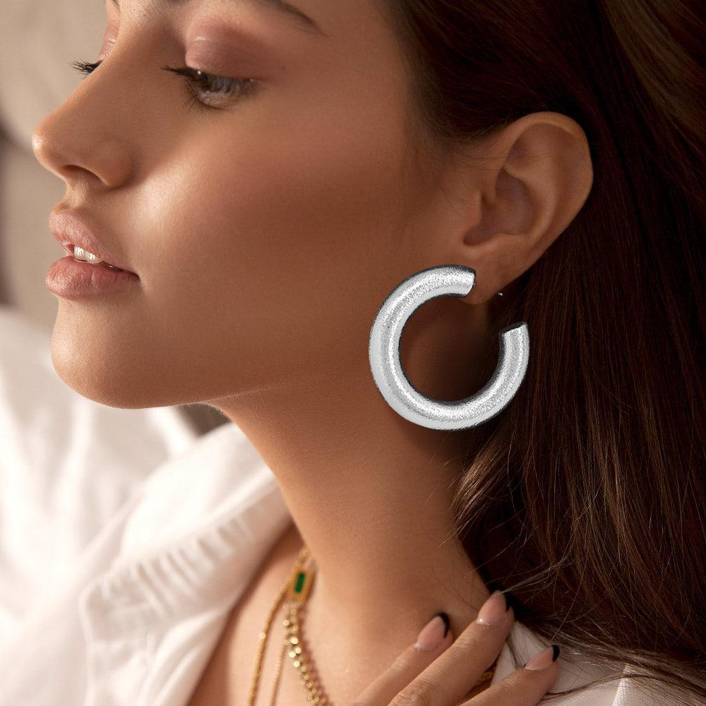 Metal Hoop Earrings - Jewelry Store by Erik Rayo