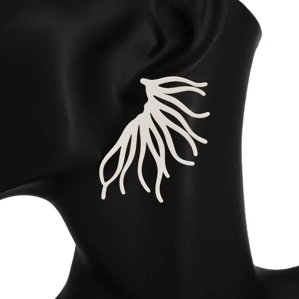 Abstract Metal Earrings - Jewelry Store by Erik Rayo