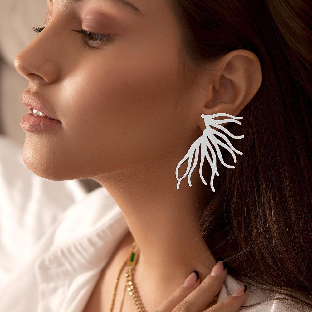 Abstract Metal Earrings - Jewelry Store by Erik Rayo