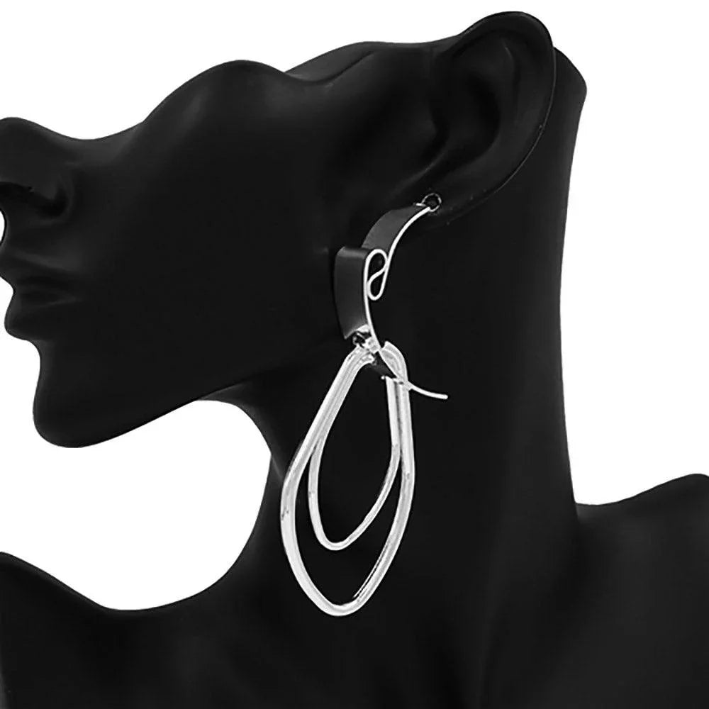 Abstract Metal Earrings - Jewelry Store by Erik Rayo